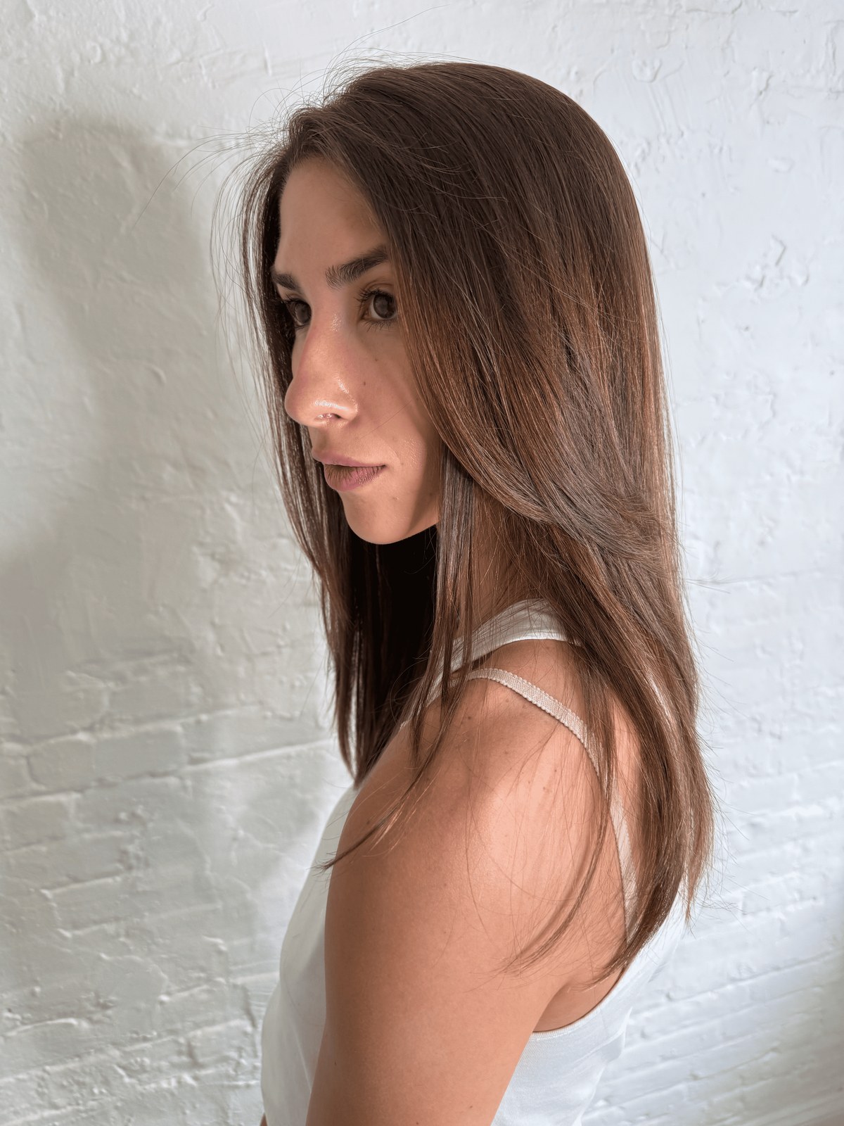 Healthy ends on long brunette hair after a precision trim, Williamsburg Salon