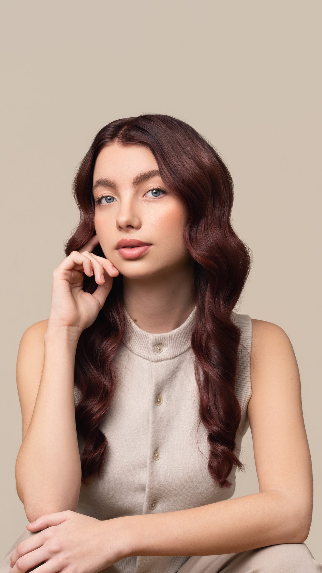 Model with deep auburn NATULIQUE Liquid Colours result, styled in soft waves